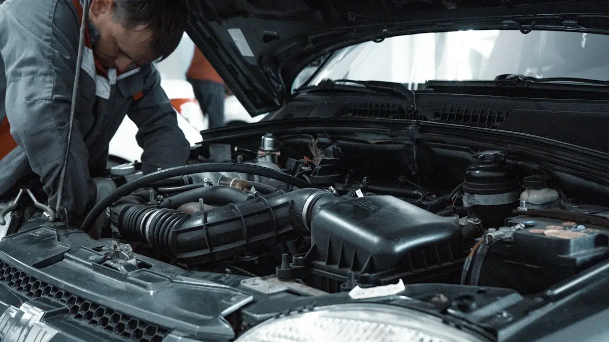 Mechanic checking an engine bay with the hood open