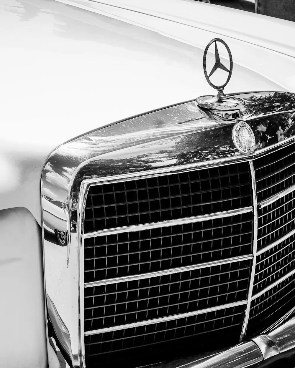 Chrome grille and hood star of a 1970s Mercedes-Benz